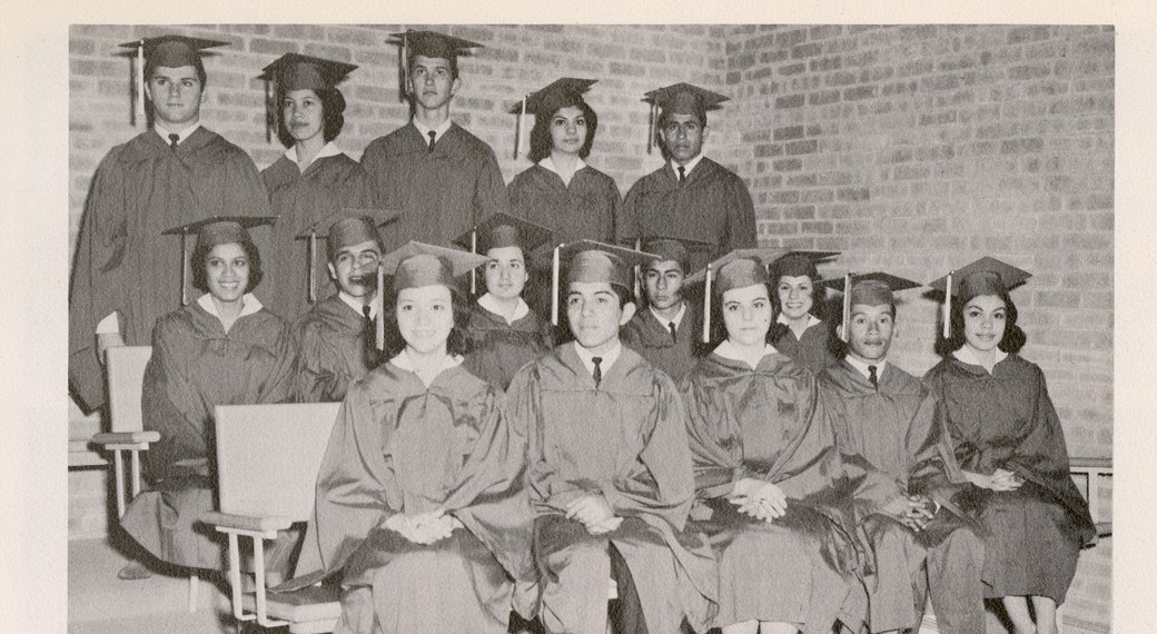 In caps and gowns, from the Senior Album.