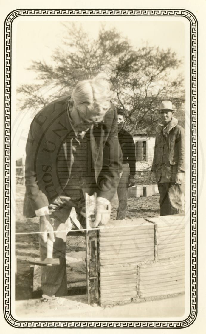Laying a brick wall.