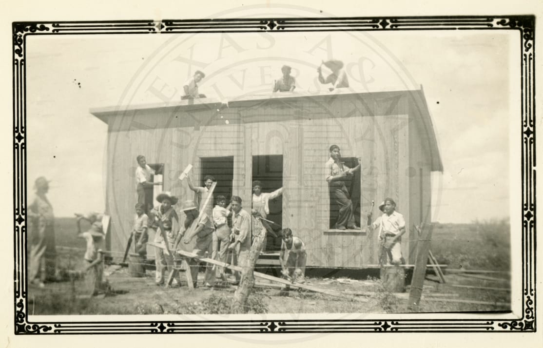 Boys building a house.