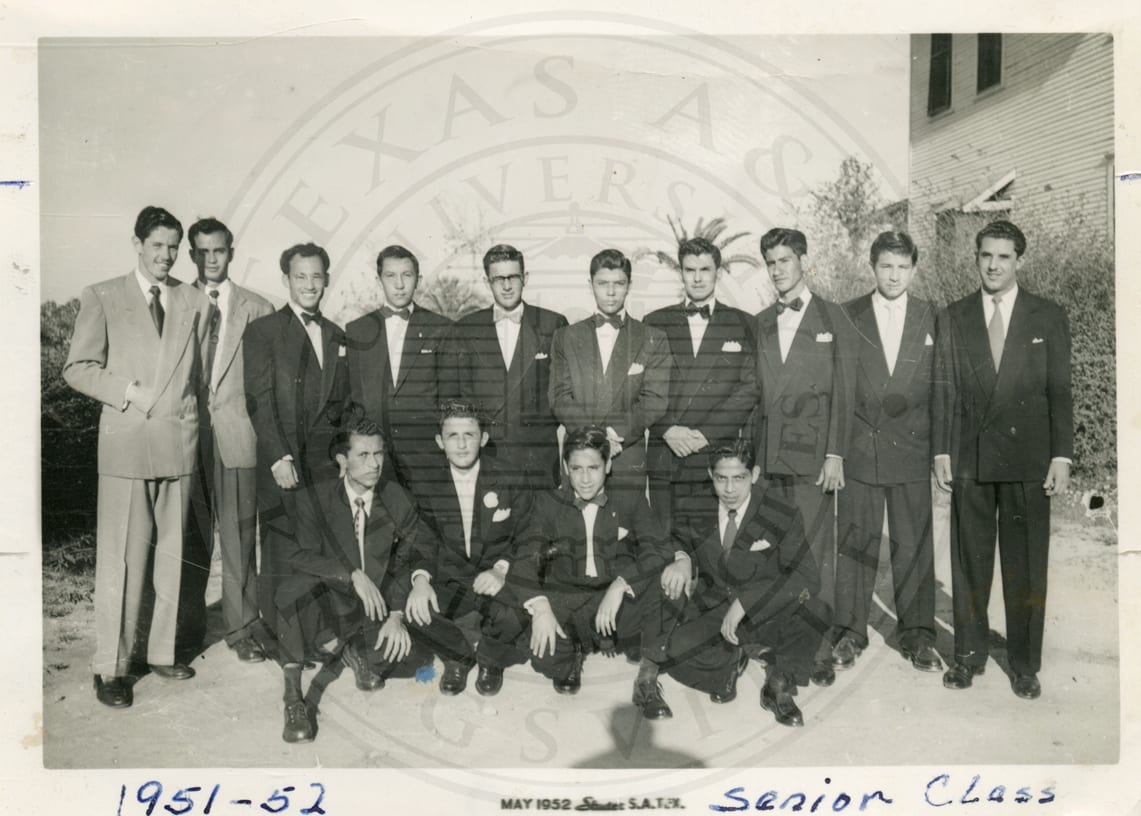 A graduating class, in suits.