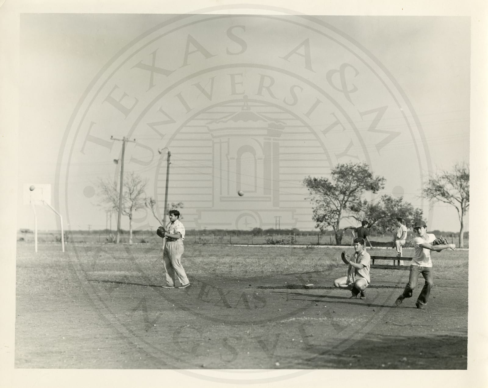 Baseball: Ricardo Rodriguez at left, Xavier Neira catching, Salvador Delgado throwing.