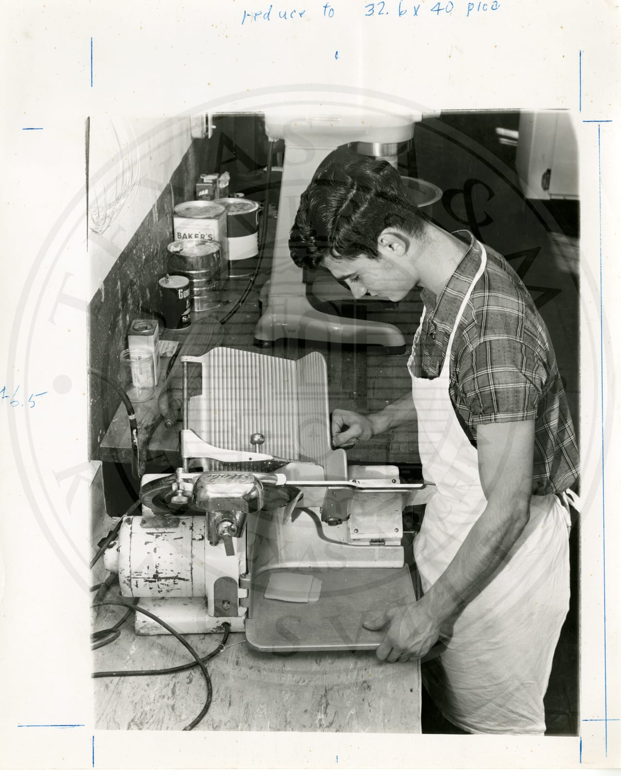 Godofredo Gonzalez at the food slicer.
