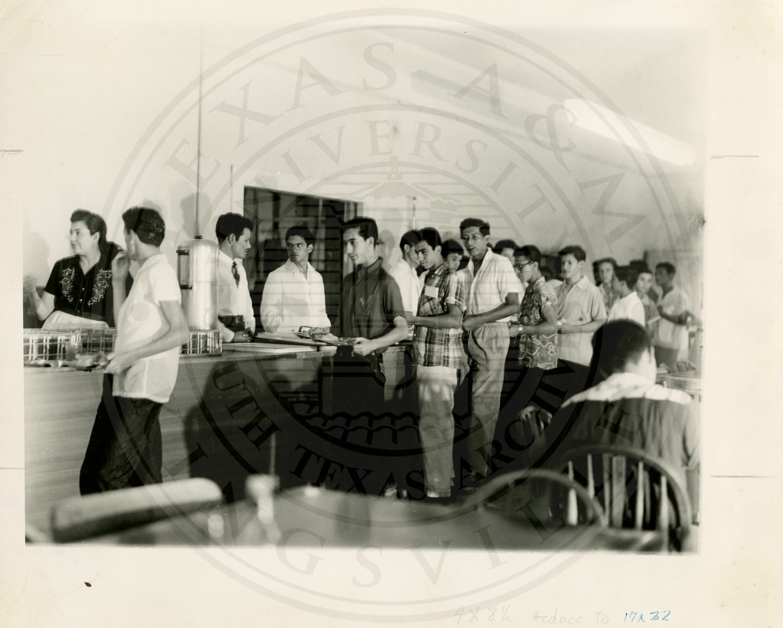 Mr. and Mrs. Ismael Valero and students in the lunch line.