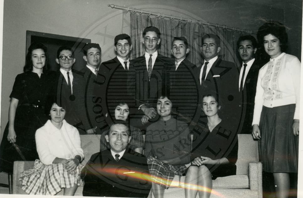 In suits and dresses.
