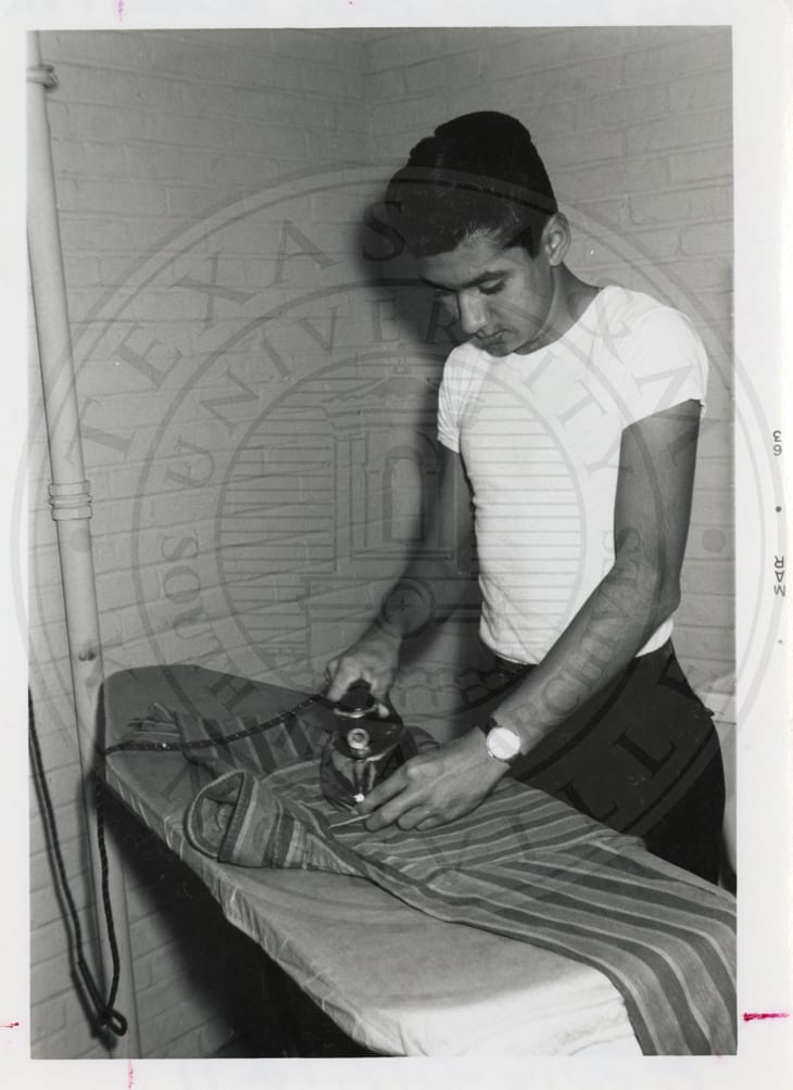 Dorm life: ironing, February 1963.
