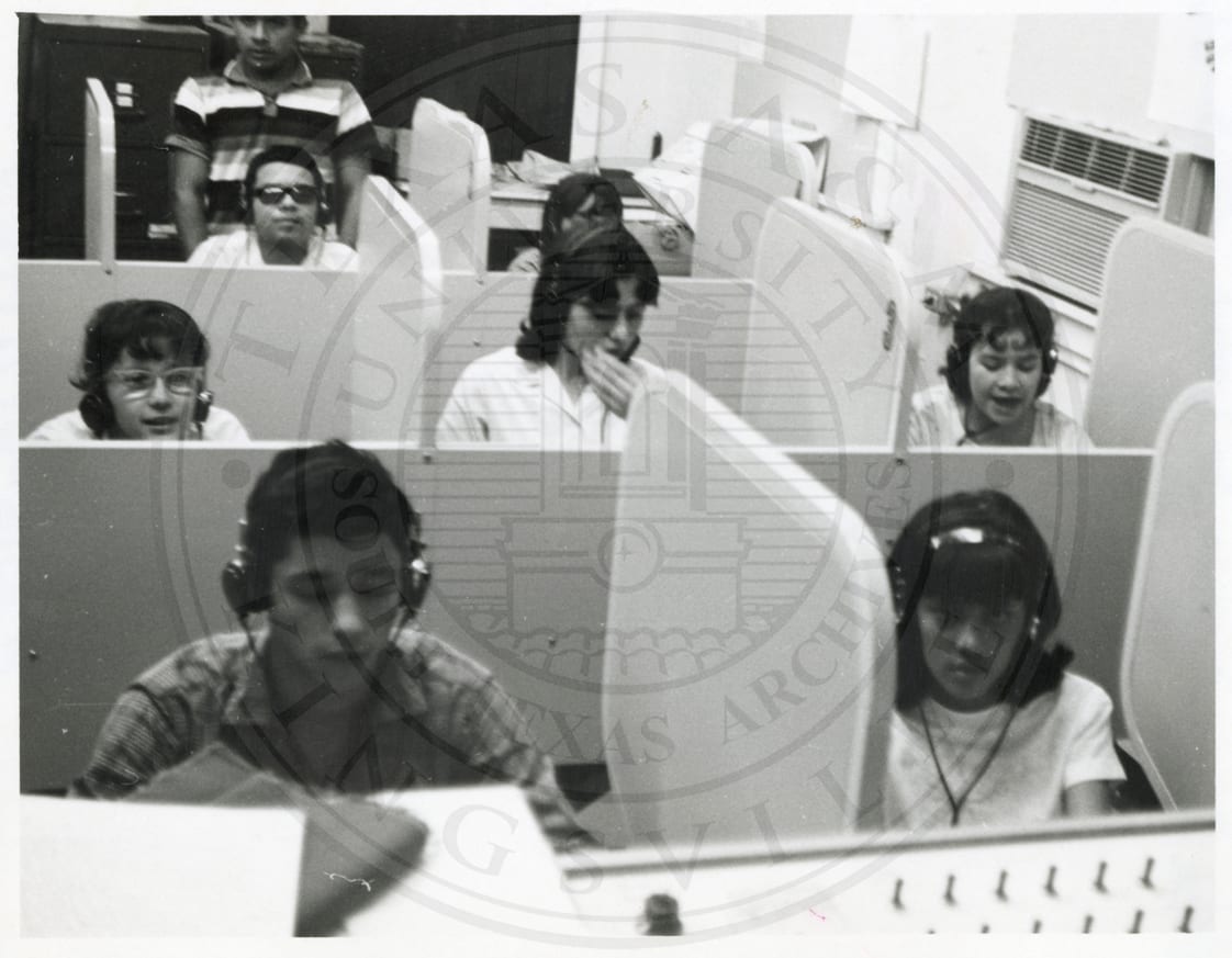 Headphones in the language lab, 1965–66.