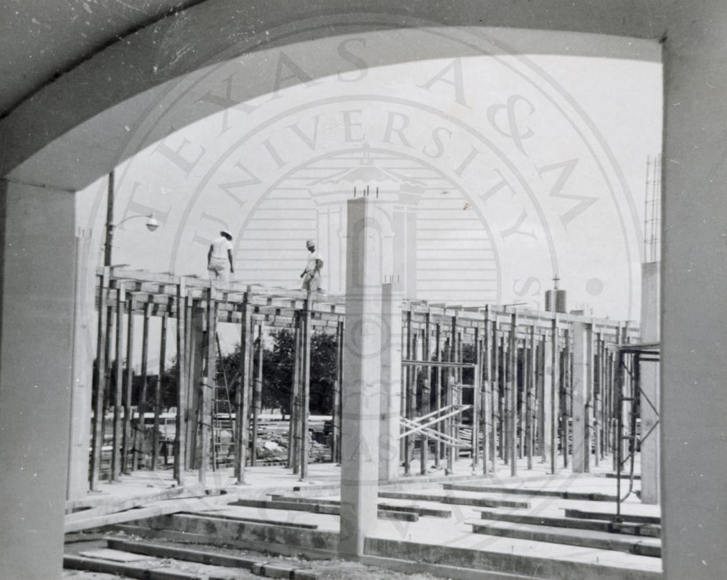 Two workers on top of the structure, 1966.