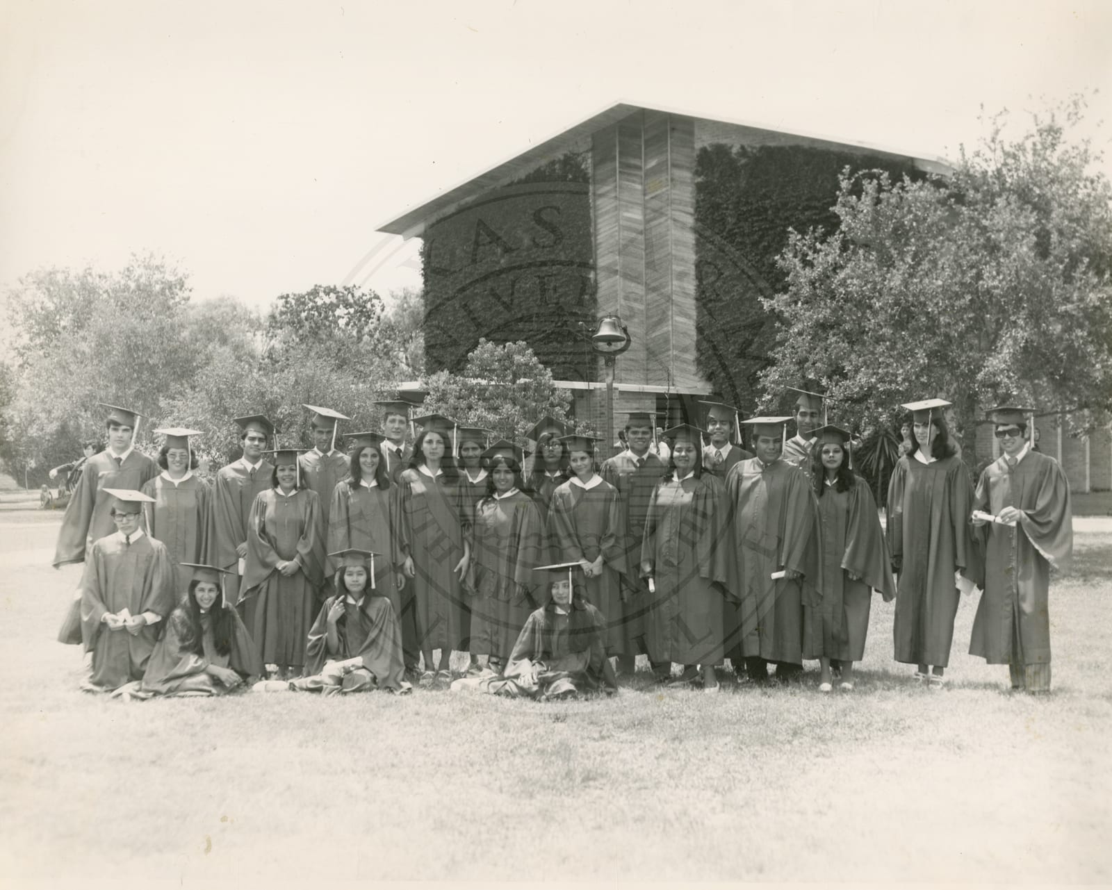 The graduating class in gowns.