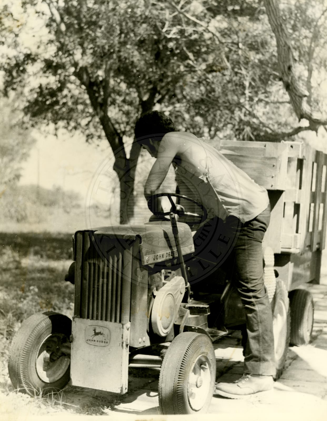 On the tractor, 1970.