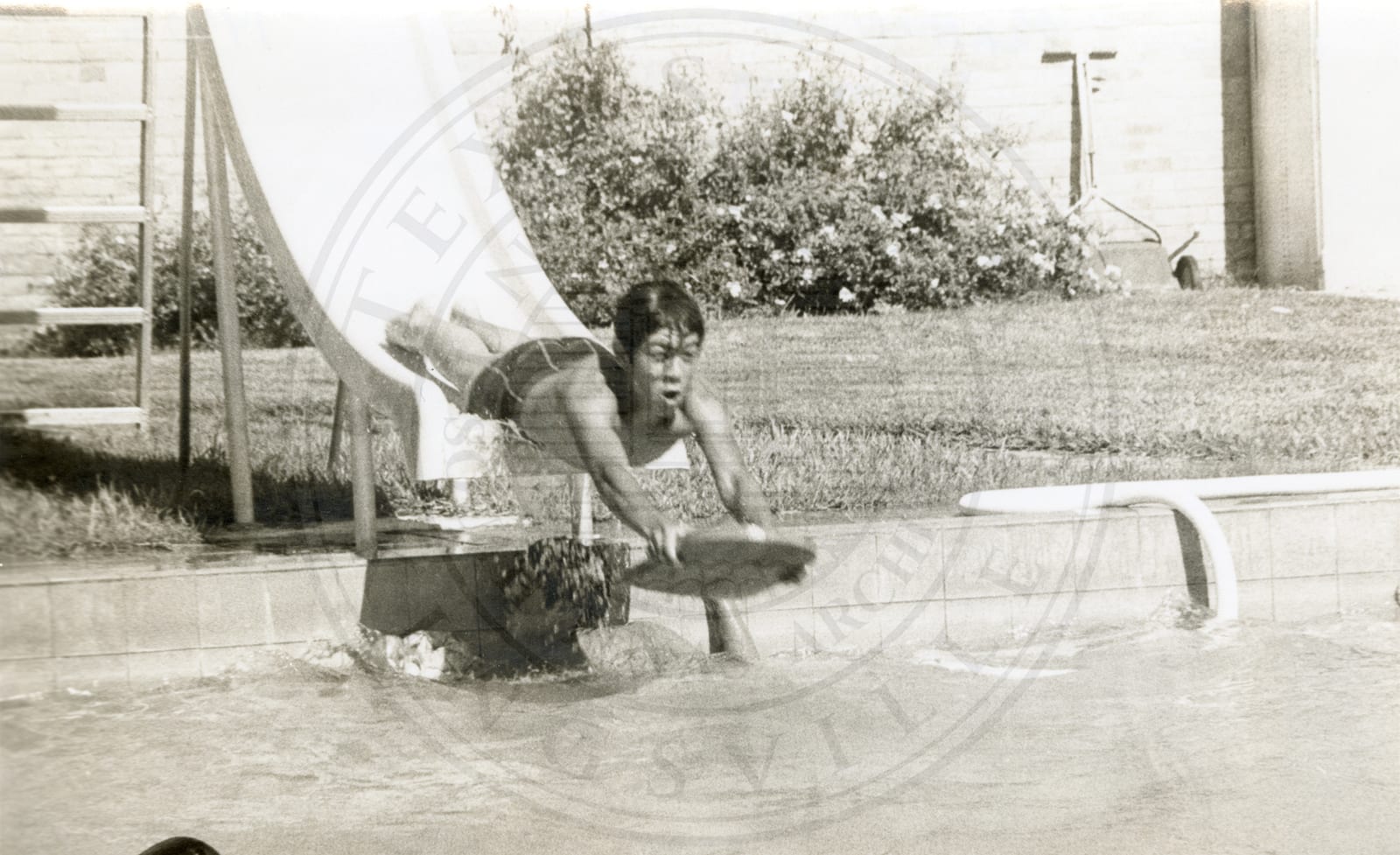 The slide into the pool.