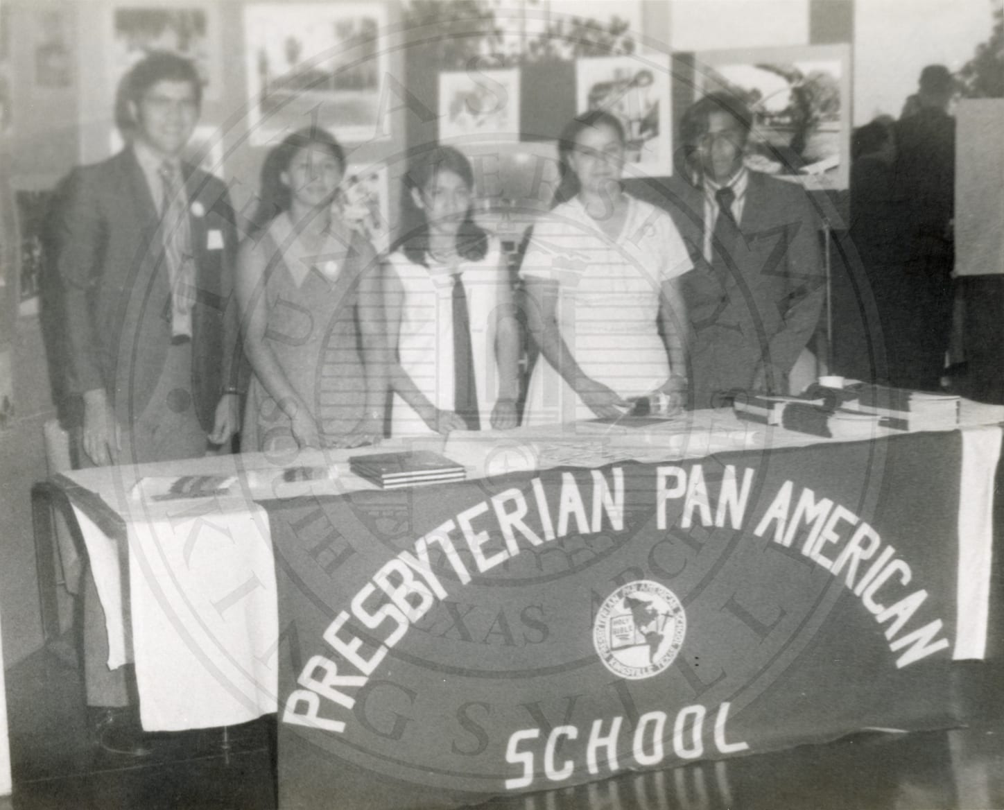 Behind the school banner, summer 1971.