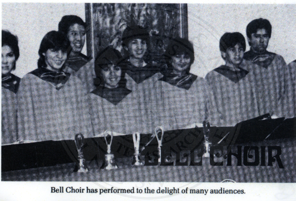 The bell choir, ‘performed to the delight of many audiences’.