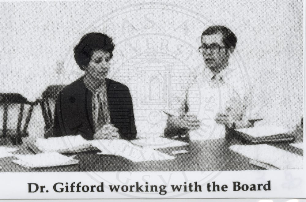 Dr. Gifford working with the Board.
