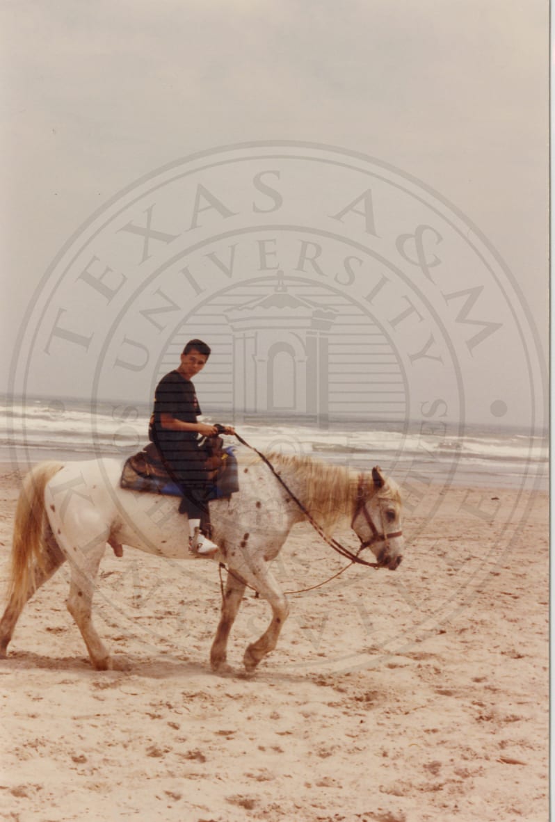 On horseback at the beach, 1990.