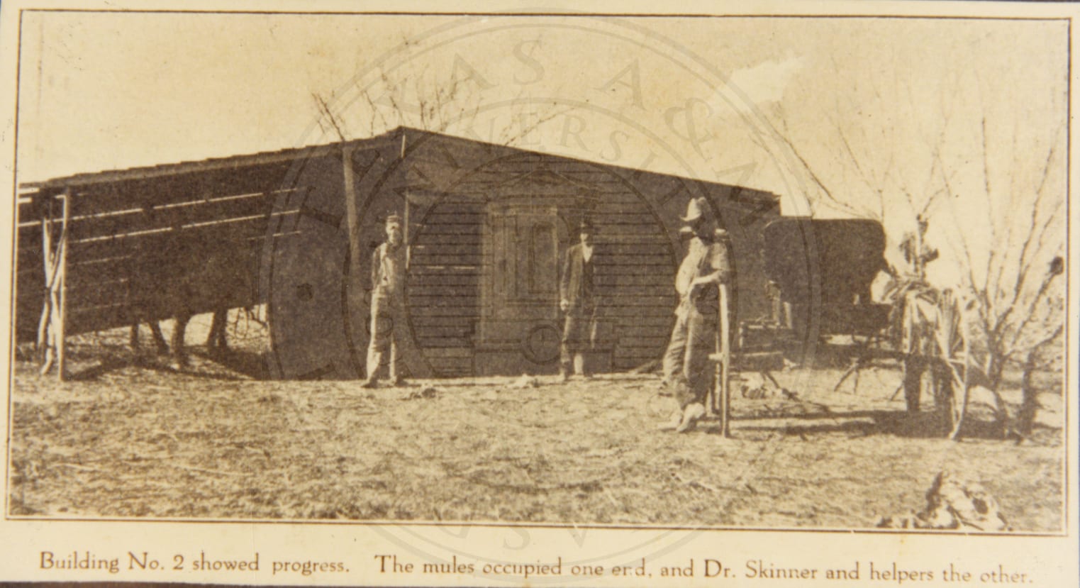 Construction of ‘building no. 2’, Dr. James William Skinner at the centre.