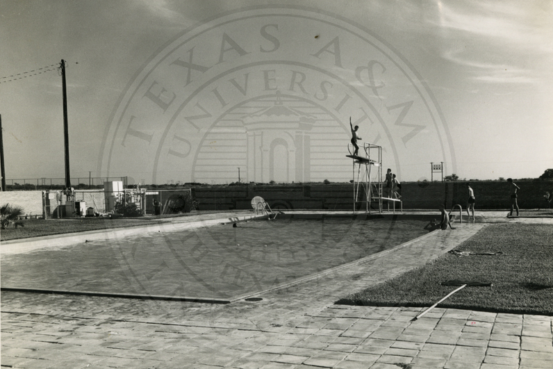 The outdoor swimming pool under construction.