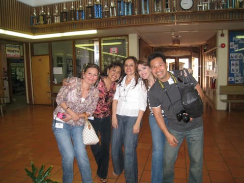 Friends back in the classroom building hall before the Centennial.