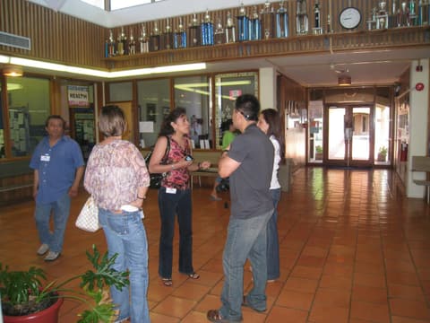 Alumni wandering the classroom building hall before the Centennial.