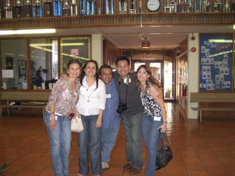 Friends from the early 1980s in the classroom building hall.