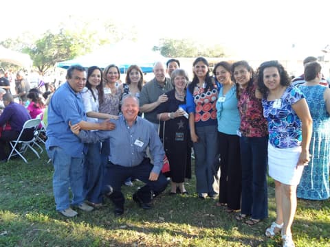 Alumni together at the Centennial barbecue dinner on the lawn, May 2012.