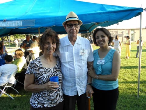 Alumni together at the Centennial barbecue dinner on the lawn, May 2012.