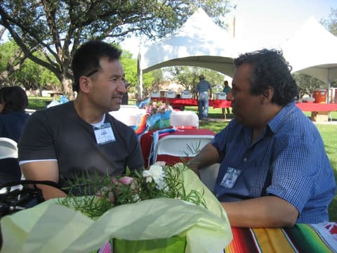 Alumni together at the Centennial barbecue dinner on the lawn, May 2012.