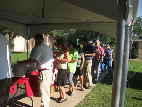 Alumni together at the Centennial barbecue dinner on the lawn, May 2012.