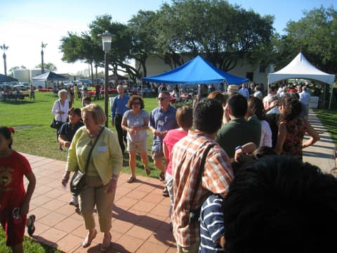 Alumni together at the Centennial barbecue dinner on the lawn, May 2012.