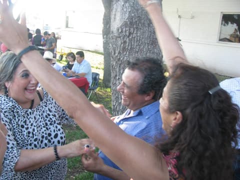 Alumni together at the Centennial barbecue dinner on the lawn, May 2012.