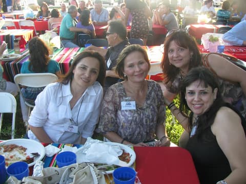 Alumni together at the Centennial barbecue dinner on the lawn, May 2012.