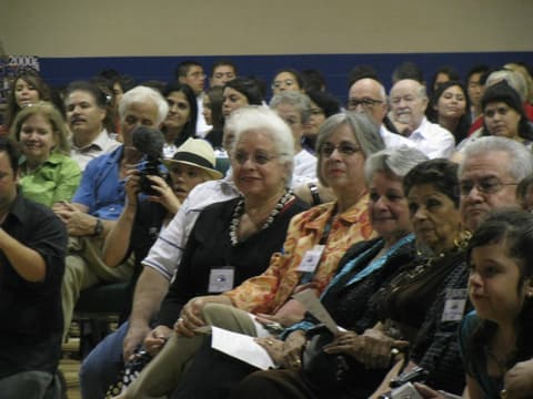 Generations of alumni in the audience at the Centennial program.