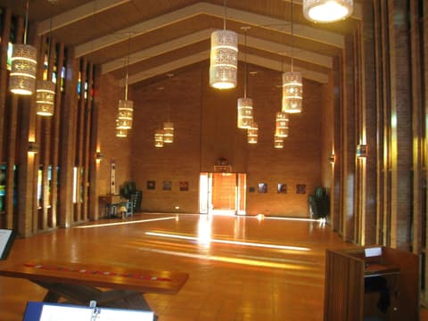 The chapel emptied of chairs, glowing in the evening light, 2012.