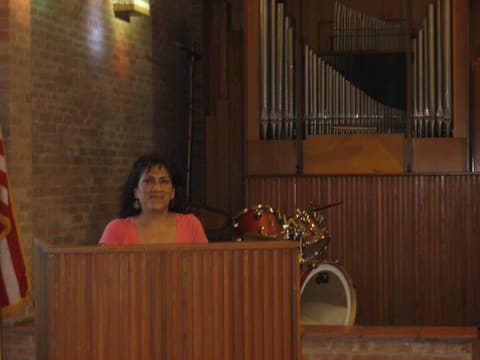 Yolanda Reyes gives a chapel talk again, before the pipe organ.