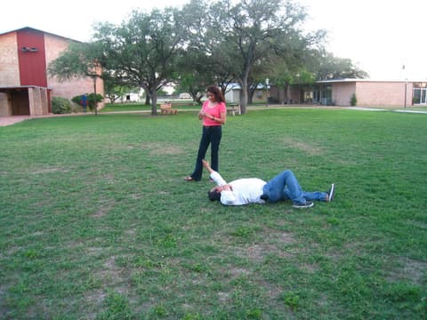 Lying in the grass watching the clouds, like in their student days, during the 2012 Centennial visit.