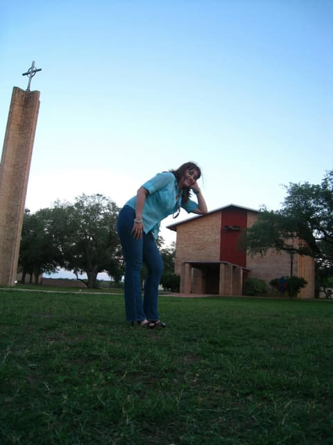The classic Pan Am photo: pretending to lean on the top of the chapel tower.