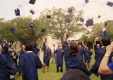 The Class of 1999 throws its caps in the air on graduation day.