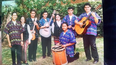 A student folk band in woven shirts with guitars and a drum, late 1990s: Hector Sanchez Pulido, Waldo Hernandez, David Rios, Josue De Lara, Juan Herrera and Jesus Hernandez.