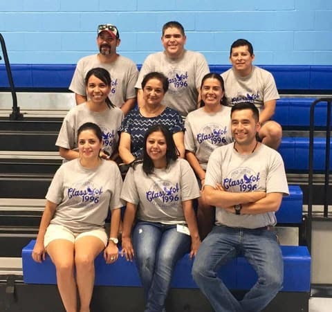 The Class of 1996 in the gym at its reunion; classmates fondly remember Mrs. Goswami.