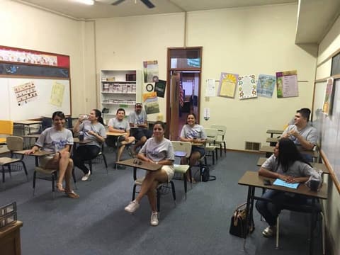 The Class of 1996 back in a classroom at its reunion.