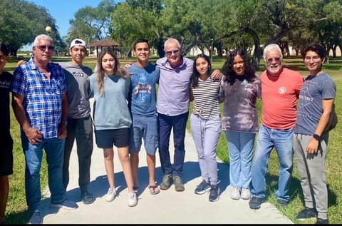 The Cuban classmates of the early 1970s with current students during their campus visit.