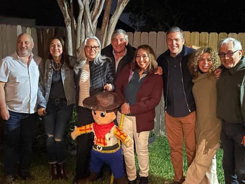 Members of the Class of 1985 together again at a backyard reunion.