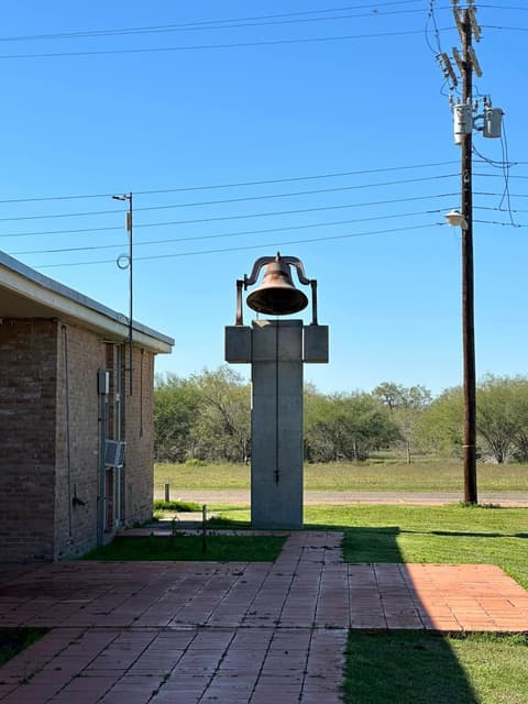 The dining hall bell — alumni remember ringing it for breakfast, which made them punctual.