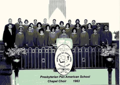 The Presbyterian Pan American School Chapel Choir, 1963, in robes before the organ pipes — the choir that sang atop the Pyramid of the Sun on its Mexico trip.