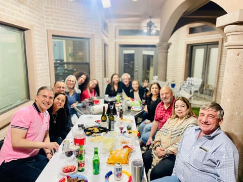 A reunion dinner on a patio.