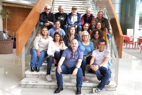 The Mexico City reunion group on a staircase.