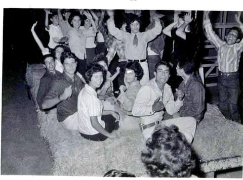 A hayride at Pan Am around 1962; a classmate spots Moises Garcia and one of the de Lugo sisters.