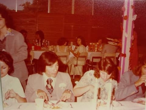 Dressed up for a banquet in the decorated dining hall.