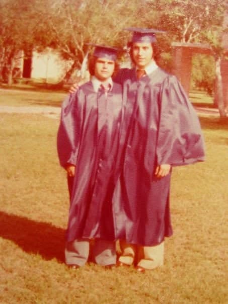 Best friends and roommates in caps and gowns on graduation day, 1978.