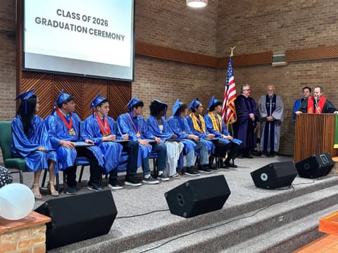 The Class of 2026 on the chapel stage at the start of the ceremony.