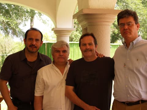 Four friends from the Class of 1978 — “33 years of friendship… well, 35”.